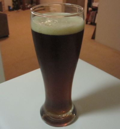 A glass of Important Date Dark Ale
